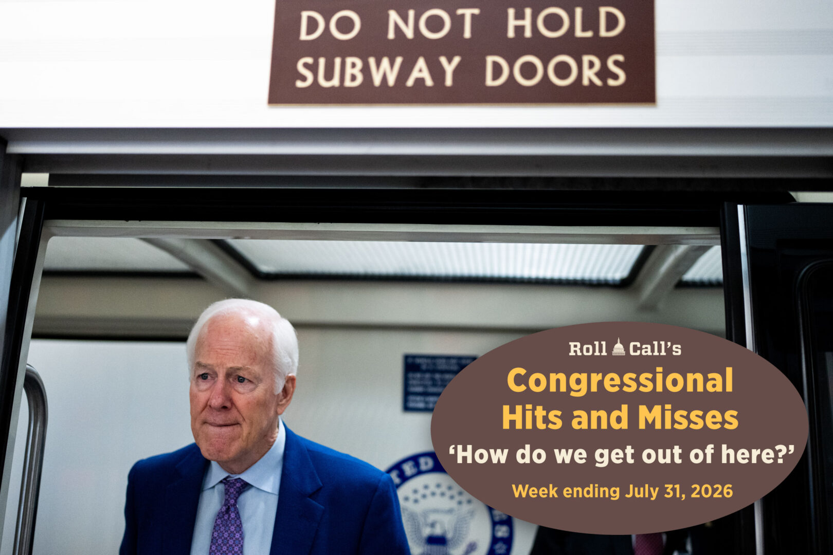 Sen. John Cornyn, R-Texas, speaks to a reporter as he boards the Senate subway on July 30, 2026. 