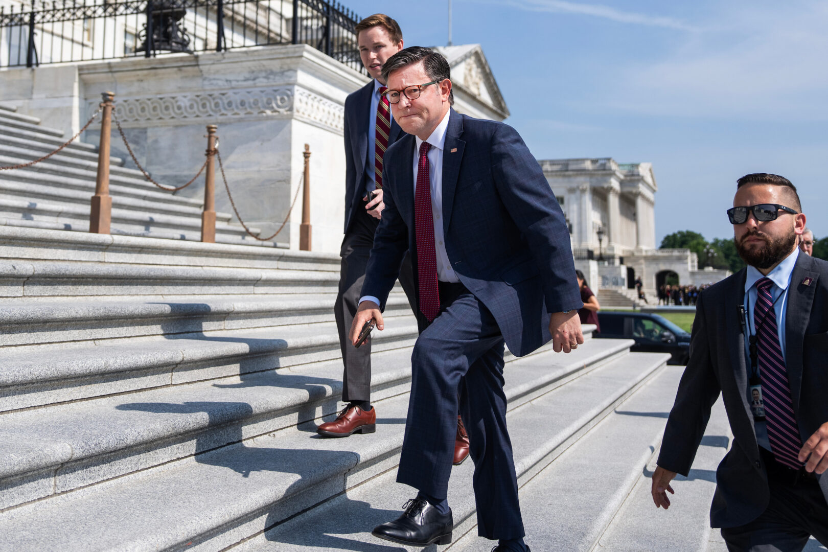 Speaker Mike Johnson, R-La., is seen on the House steps in June. This month he’ll be treading familiar ground as he tries again on some priorities. 