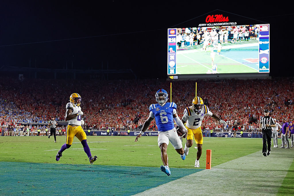 Ole Miss quarterback Trinidad Chambliss scores a touchdown during the Rebels' win over the visiting LSU Tigers at Vaught-Hemingway Stadium on Sept. 19 in Oxford, Miss. (Justin Ford/Getty Images)