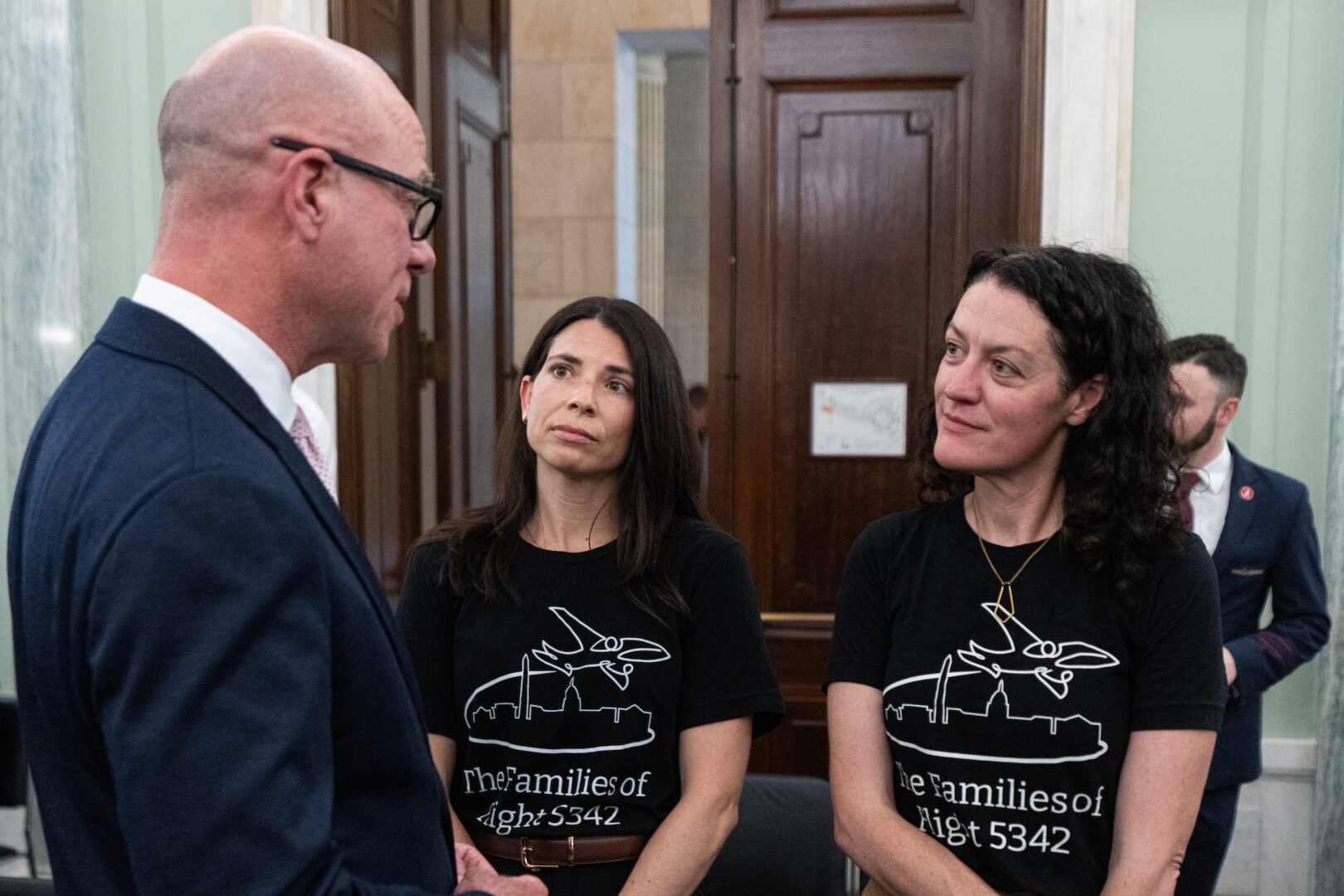 FAA Administrator Bryan Bedford speaks with family members who lost loved ones on flight 5342 before a related hearing on Capitol Hill on  May 19, 2026. 